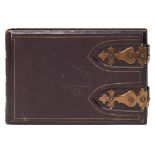 A Victorian brass and leather bound photograph album:, containing sixty carte de visite photographs,