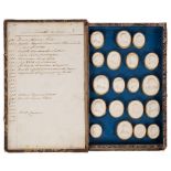 Grand Tour Intaglios : a collection of 32 Italian plaster intaglios rimmed in gilt,