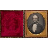 A 1/6th plate daguerreotype portrait of man with neckerchief:, hand tinted,