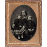 A Victorian 1/4 plate ambrotype portrait of a Scottish family of a mother and her two children:,