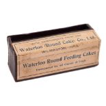 A 'Laughing Camera' :, in red with gilt text, paper label, 'Compliments of Waterloo (Round Cake) Co,