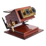 Stereoscope Viewer : A mahogany and lacquered brass tabletop achromatic stereoscope by R & J Beck,