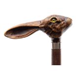 A 20th century walking stick: with moulded resin handle in the form of a hare's head with glass