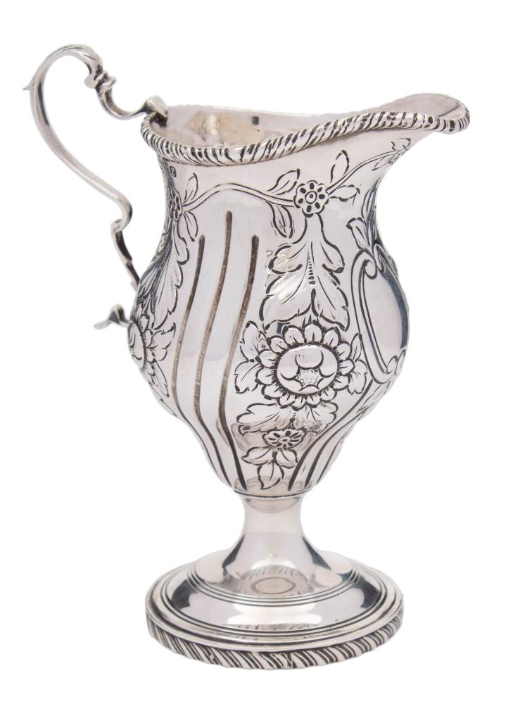 A George V silver cream jug, maker George Nathan & Ridley Hayes, Chester,