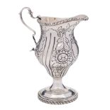 A George V silver cream jug, maker George Nathan & Ridley Hayes, Chester,