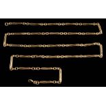 A 9ct gold lozenge-shaped link chain: on bolt ring clasp with Birmingham assay marks,