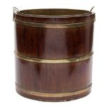 An 18th century walnut and brass bound bucket: of navette-shaped outline, 37cm. high.