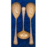 A pair of George III and later decorated silver gilt berry spoons, maker William Eley,