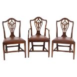 A harlequin set of ten 19th Century mahogany dining chairs in the Hepplewhite taste:,