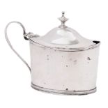 A George III silver mustard pot, maker Charles Chesterman II, London, 1806: crested,