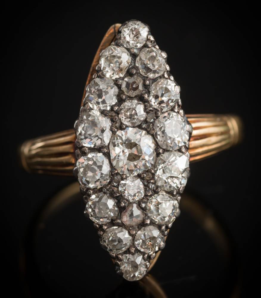 A late 19th century diamond mounted marquise-shaped cluster ring/brooch: with diamonds estimated to