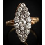 A late 19th century diamond mounted marquise-shaped cluster ring/brooch: with diamonds estimated to