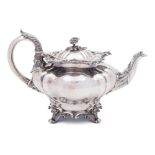 A William IV silver teapot, maker Charles Gordon, London, 1835: of squat lobed form,