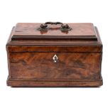 A George III mahogany tea caddy: with pagoda top, brass scroll handle and divided interior,