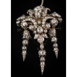 A late 19th century gold, silver and diamond brooch pendant: of openwork foliate design,