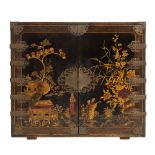 A Chinoiserie black lacquer and engraved brass mounted cabinet:,