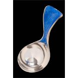 * An Elizabeth II silver and enamel caddy spoon, maker Jenny Edge, London,