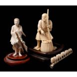 A Japanese carved ivory okimono of a peasant: surprised by a crab in his wicker basket, unsigned,