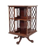 An Edwardian mahogany square revolving bookcase:,