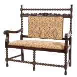 A carved walnut settee in the 17th Century taste:,