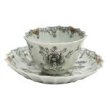 A First Period Worcester teabowl and saucer: of fluted form with flaring rims,