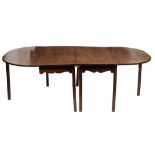 A George III mahogany D-end dining table:, in two sections,