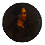 A 19th century papier mache snuff box: the circular lid decorated with a portrait of an Italian