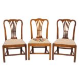 A set of six George III mahogany dining chairs:,
