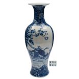 A Chinese porcelain vase: of slender baluster form with flaring neck painted in blue with a panel
