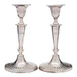 A pair of Victorian silver candlesticks, maker William Hutton & Sons Ltd, London,
