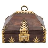 A Colonial coromandel wood and brass bound casket: of rectangular outline with hinged domed lid