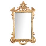 An 18th Century carved giltwood and gesso wall mirror:,