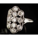 A platinum and diamond rectangular plaque cluster ring: with eleven round old,