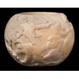 A Japanese carved ivory bowl: of circular outline, decorated with howler monkeys amongst pine trees,