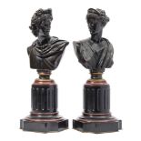 A pair of late 19th century Continental bronze busts of the Apollo Belvedere and Diana: mounted on