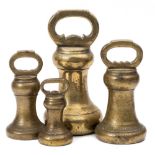 A set of four 19th century graduated brass weights: of bell-shaped outline with loop carrying