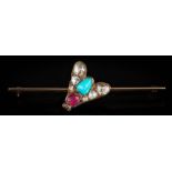 A rose diamond, turquoise and ruby mounted 'fly' bar brooch: approximately 51mm long, 4.