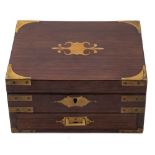 A 19th century rosewood and brass mounted lady's travelling vanity box: of rectangular outline,