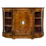 A Victorian burr walnut, inlaid and gilt metal and porcelain mounted credenza:,