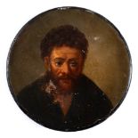 A 19th century papier mache snuff box: the circular lid decorated with a portrait of a bearded