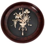 A Japanese lacquered and ivory panel: of circular outline,