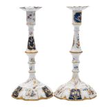 A pair of George III Bilston enamel candlesticks and sconces: each with knopped stem and domed foot,