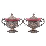 A pair of late 19th century German silver pedestal bowls and covers: each of circular outline,