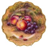 A Royal Worcester fruit painted porcelain plate by Lockyer: with shaped and gadrooned gilt rim,