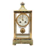 An onyx and enamel French mantel clock: the eight-day duration movement striking the hours and