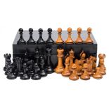 A Jacques-style Staunton pattern boxwood and ebony chess set : with weighted bases, the king 8cm.