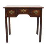 A George III mahogany rectangular lowboy:, the top with a moulded edge and re-entrant corners,