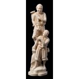 A Japanese carved ivory okimono: of fruit pickers, one smiling man standing above the other,