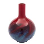 A Royal Doulton 'Flambé Veined' bottle vase: with globular body and slender neck,