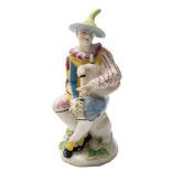 A Bow figure of Harlequin playing the bagpipes: after the Meissen original,